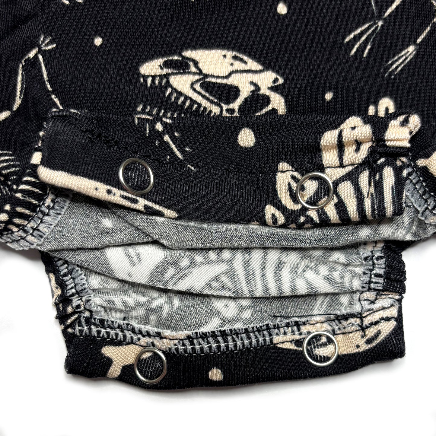 FOSSIL FIND BODYSUIT